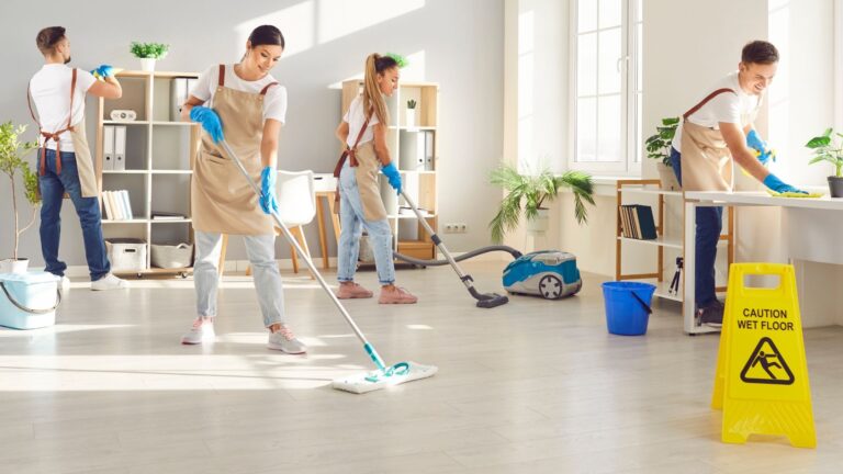 Professional cleaners mopping for expert cleaning services in Dubai